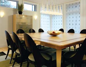 A childhood friend of Luke's built the 8-square-foot table out of stainless steel and certified sustainable maple and walnut.